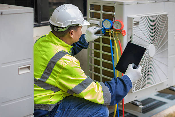 Professional Air Duct Cleaning technician working in West Greenwich, RI